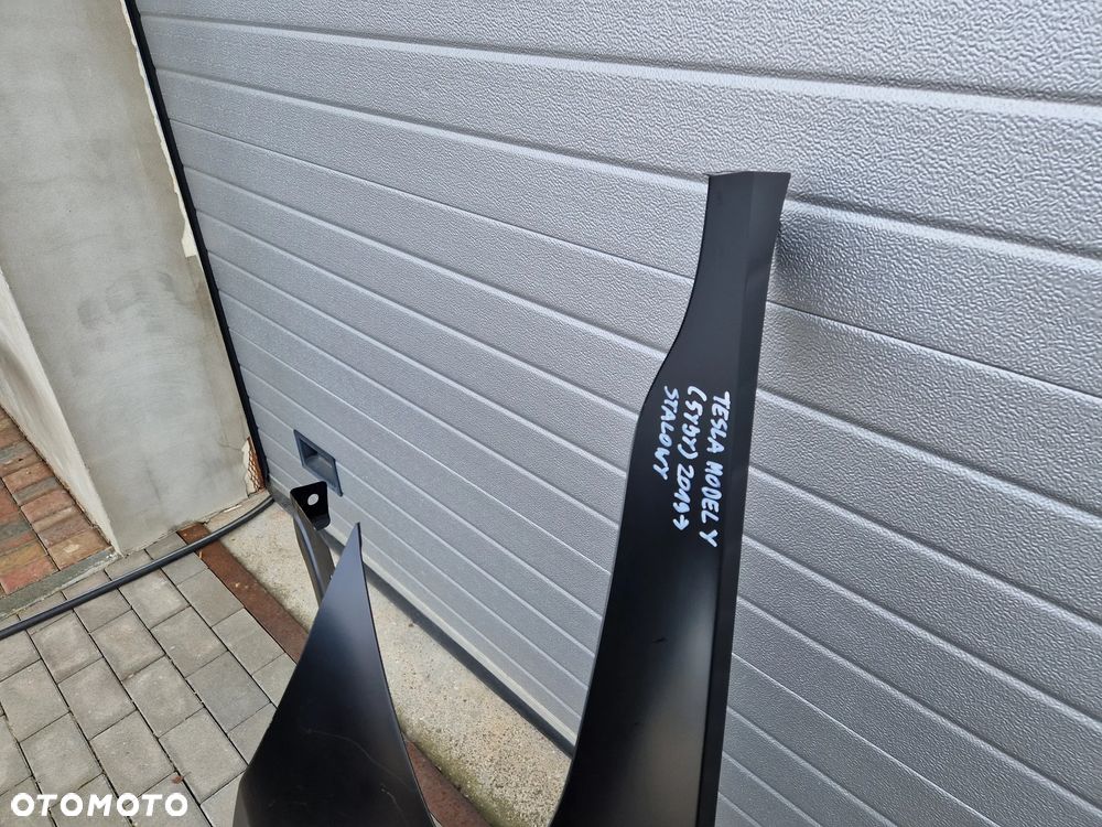 BŁOTNIK PRZEDNI LEWY TESLA MODEL Y (5YJY) 2019-- NOWY STALOWY - 2