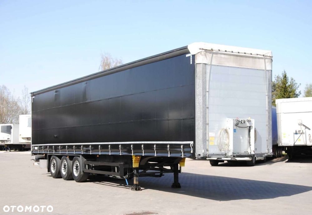 Schmitz Cargobull SCS kurtyna, podnoszona oś - 2