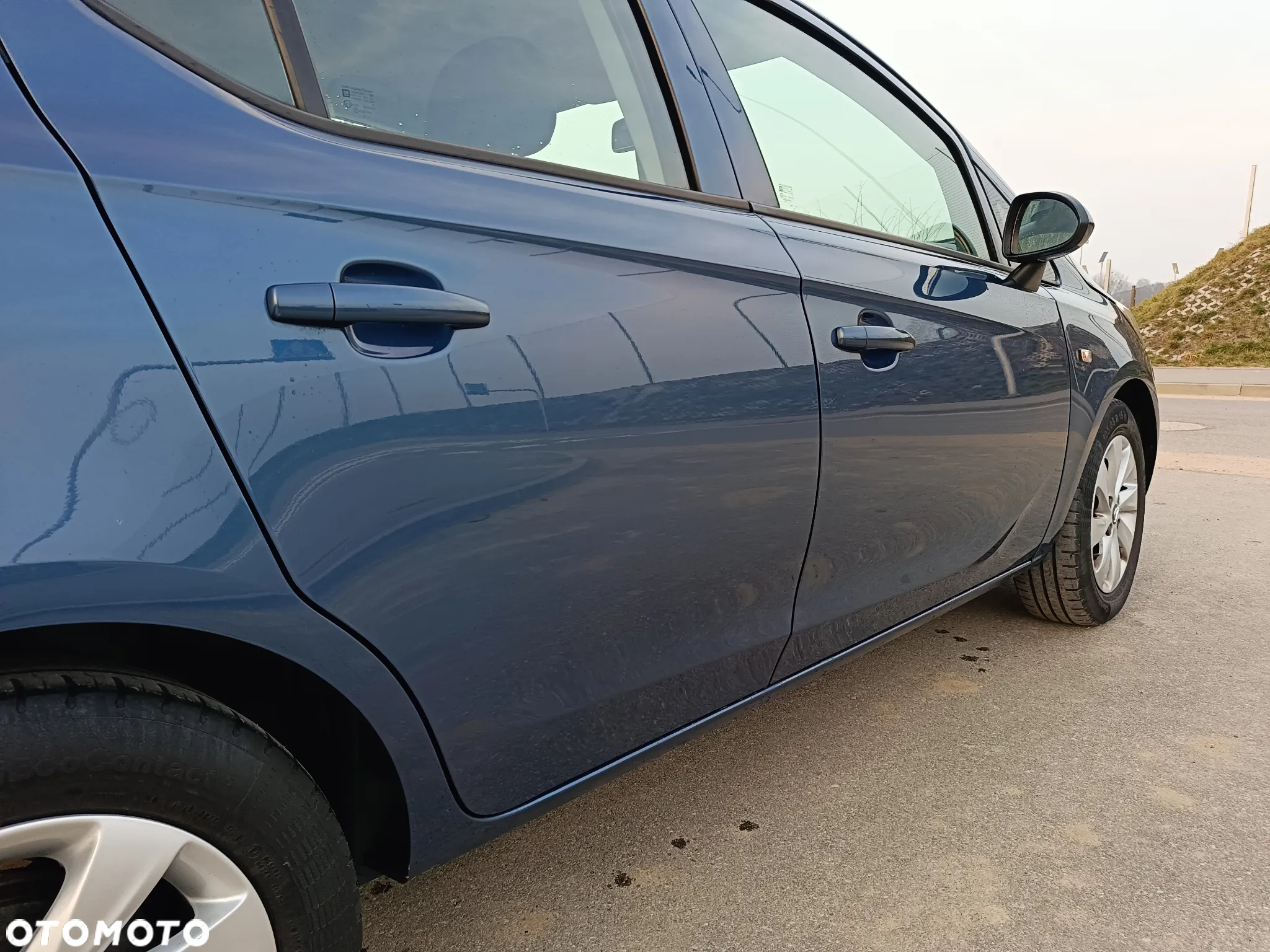 Opel Corsa 1.2 16V Enjoy - 11