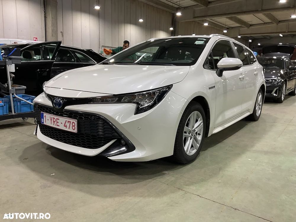 Toyota Corolla Sedan 1.8 HSD Dynamic Plus - 1