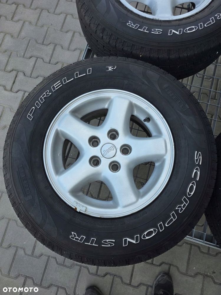 JEEP GRAND CHEROKEE KOŁA FELGI ALUMINIOWE R15 OPONY PIRELLI 225/75 - 6