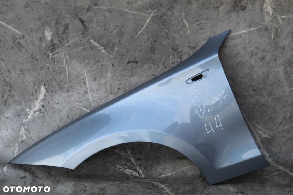 BŁOTNIK LEWY PRZÓD PRZEDNI BMW E81 E82 E87 E88 A18 QUARTZBLAU - 1