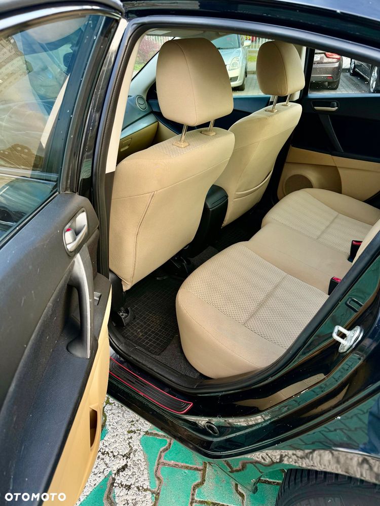 Mazda 3 2.0 Exclusive + - 10