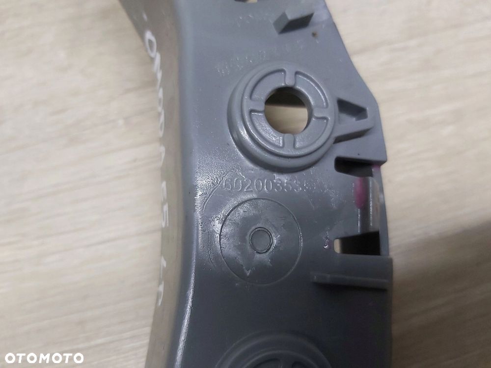 OMODA 5 E5 C5 ślizg mocowanie zderzaka lewy przód 602003535AA - 4
