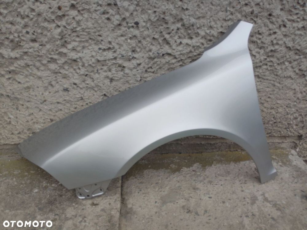 BŁOTNIK LEWY SKODA OCTAVIA II 2 9102