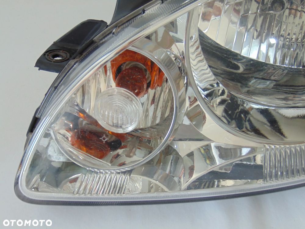 EUROPA oryginalna lampa przednia przód lewa hyundai Getz FL lift 05-09r - 2