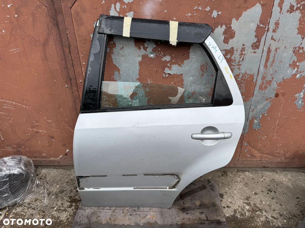 Drzwi lewe Suzuki SX4 I lewy tył tylne kolor ZCC OE - 1