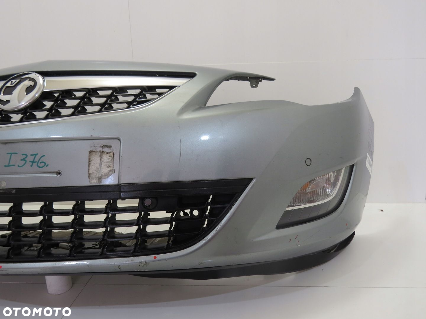 ZDERZAK PRZÓD PRZEDNI OPEL ASTRA J 09-12R - 11