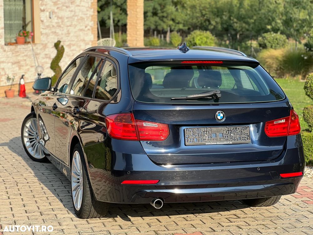 BMW Seria 3 320d DPF Touring - 4