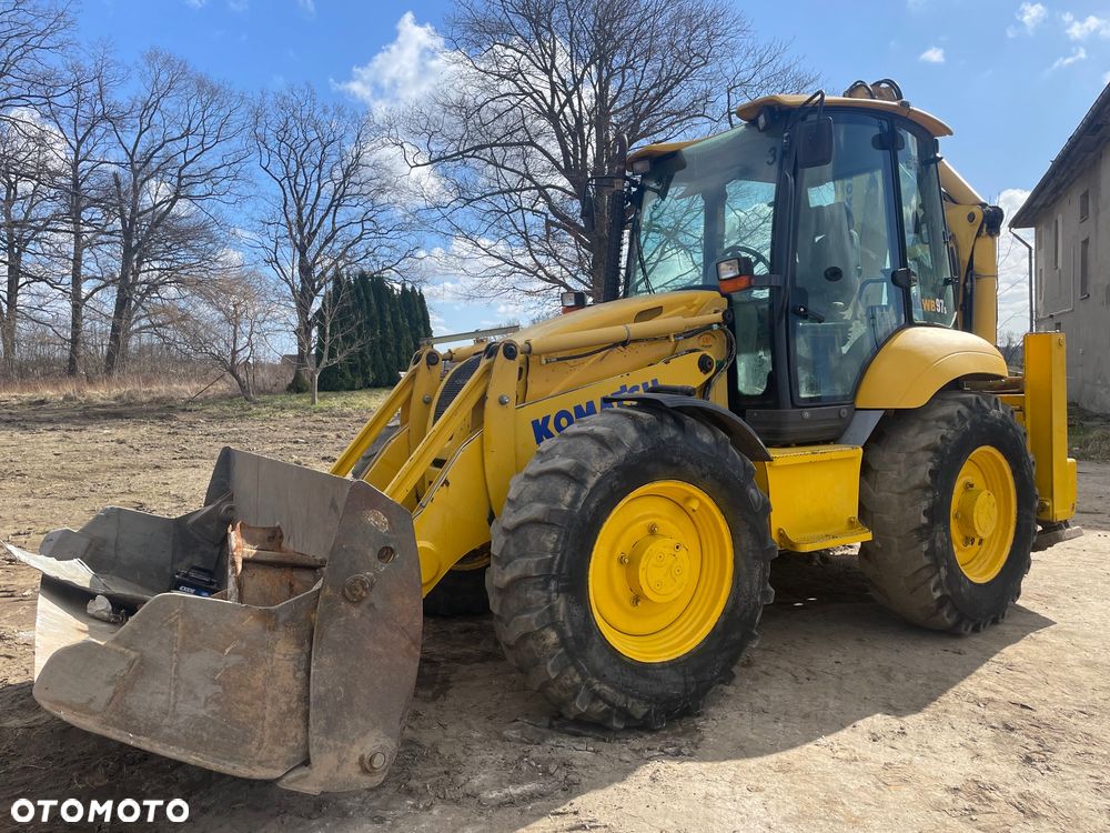 Komatsu WB97S-5E0 - 1