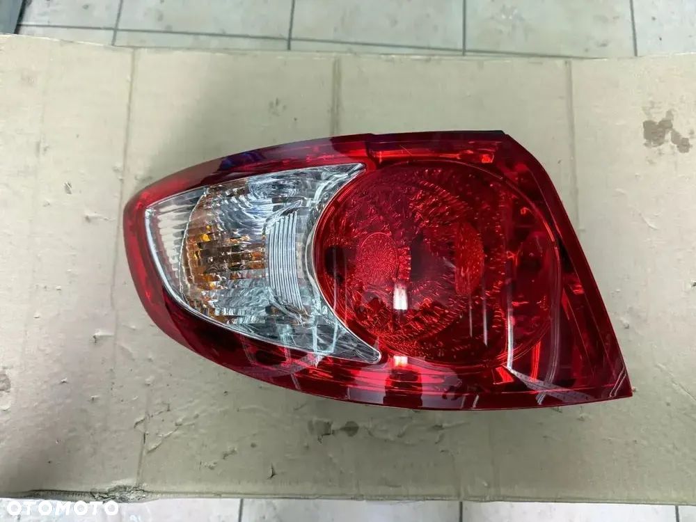 Reflektor / lampa tylna Hyundai Santa Fe II - lewa strona - oryginalna - 1