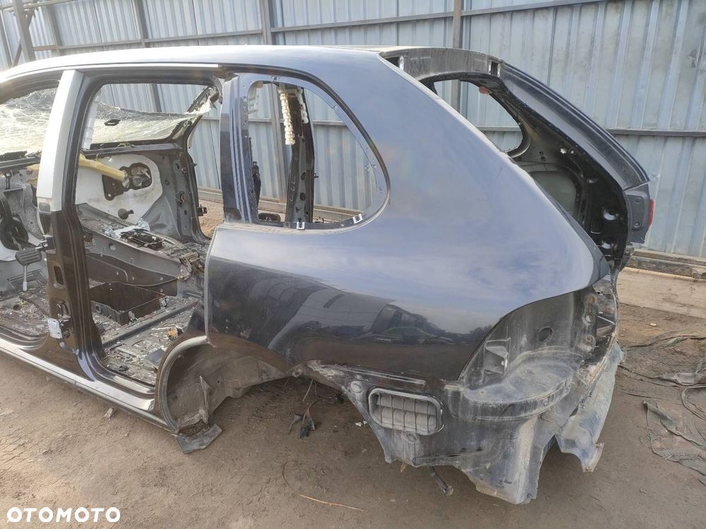 ĆWIARTKA BŁOTNIK LEWY TYŁ PORSCHE CAYENNE  I - 1