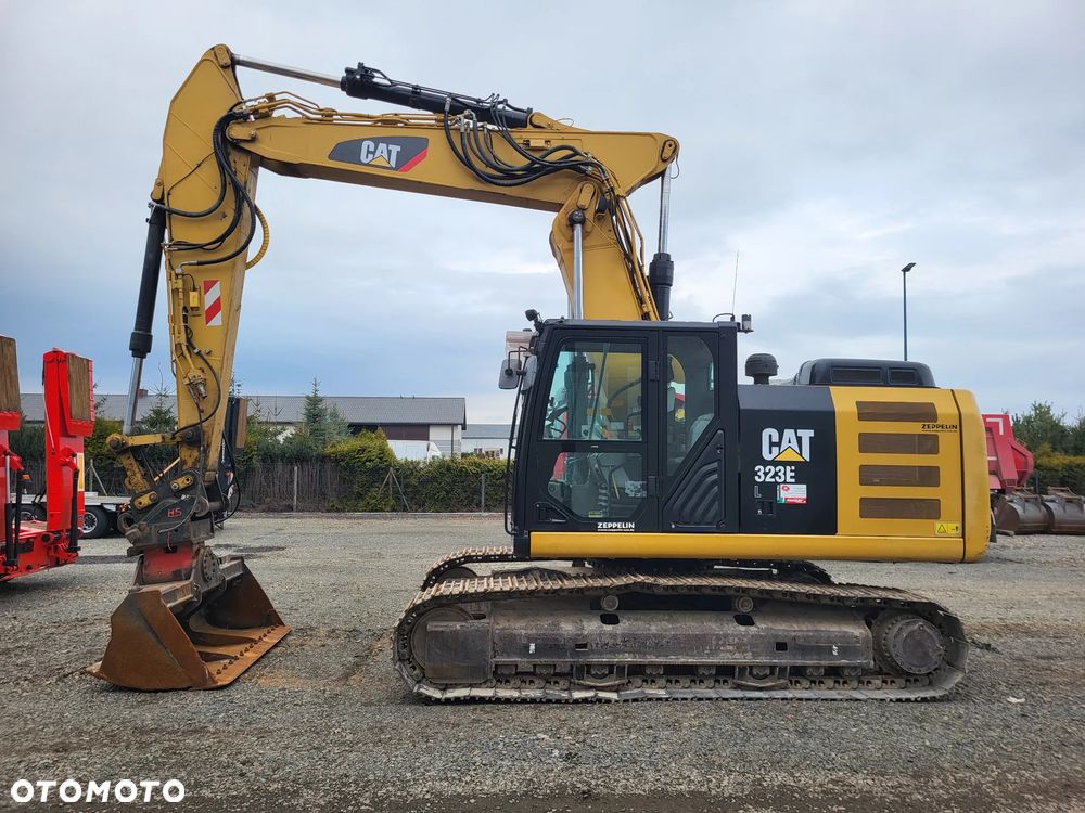 Caterpillar 323 EL / z Niemiec / Ramię 3 razy łamane / - 2