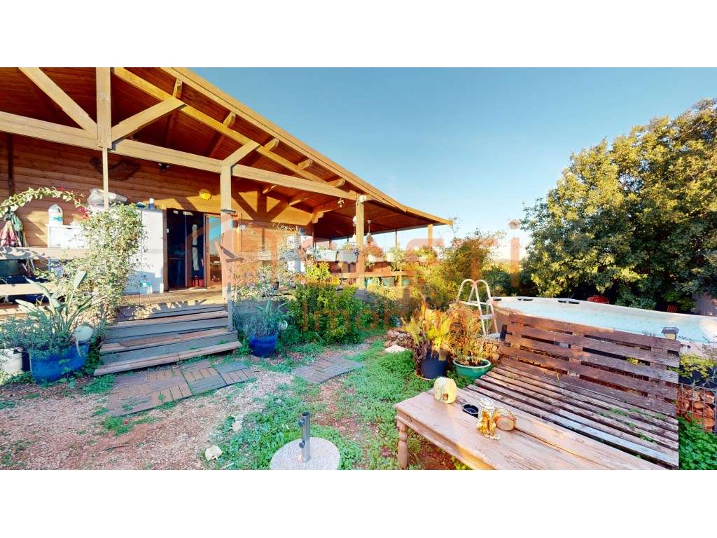 Terreno com casa de madeira e ruína em Algoz - Grande imagem: 4/52