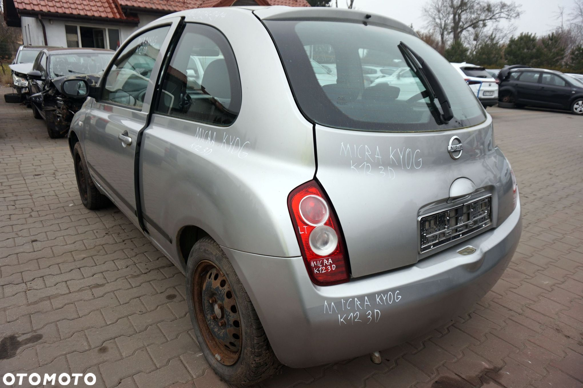 NISSAN MICRA K12 3D HB 2005 KY0 1.2 12V CR12DE 65KM SREBRNY na części - 3