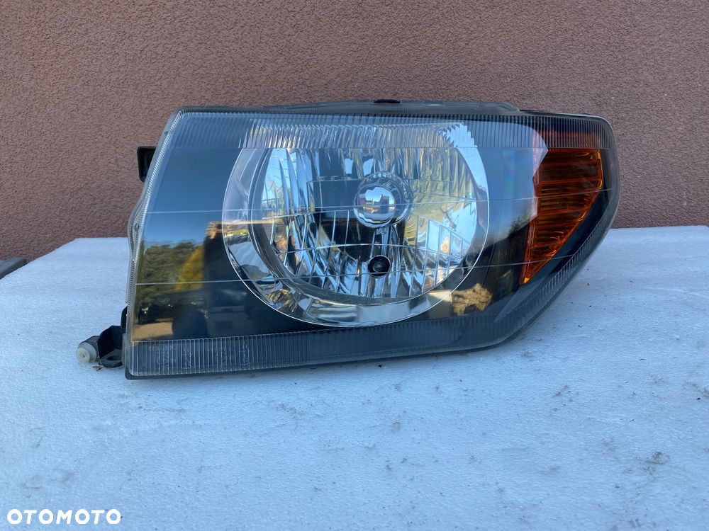 lampa pajero pinin lewa EU cała - 1