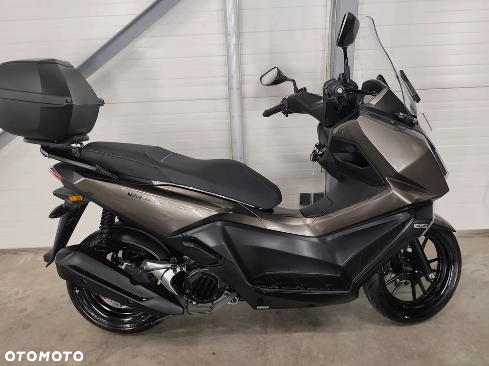 Kymco Skytown - 2
