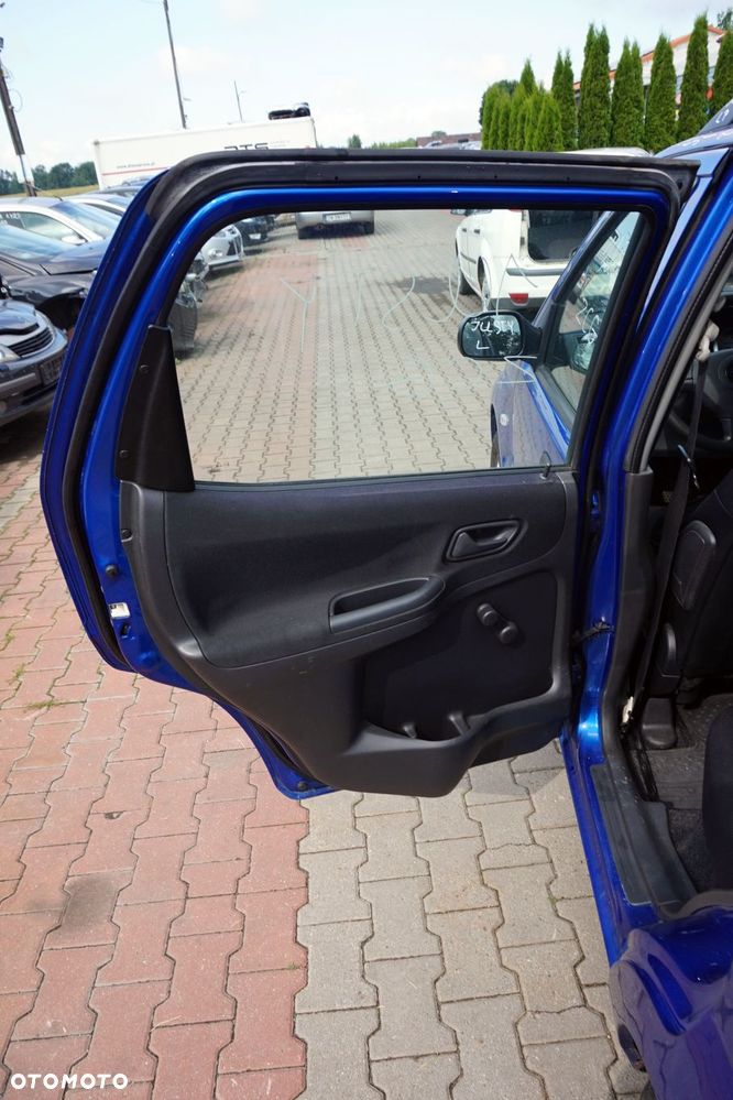 DRZWI TYLNE LEWE JUSTY III G3X ZCG  NIEBIESKI SUBARU 2003-2007 - 8