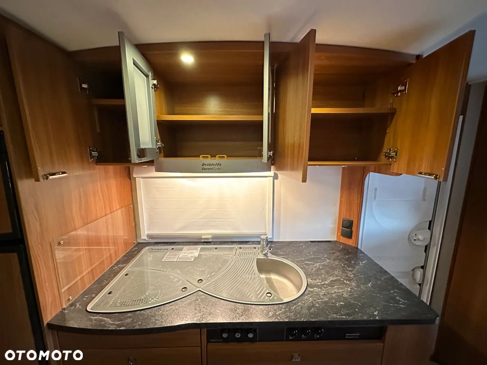 Dethleffs 550 NOMAD z przedsionkiem Isabella i łóżkami piętrowymi. - 24