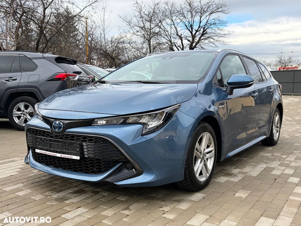 Toyota Corolla 1.8 HSD Business - 34