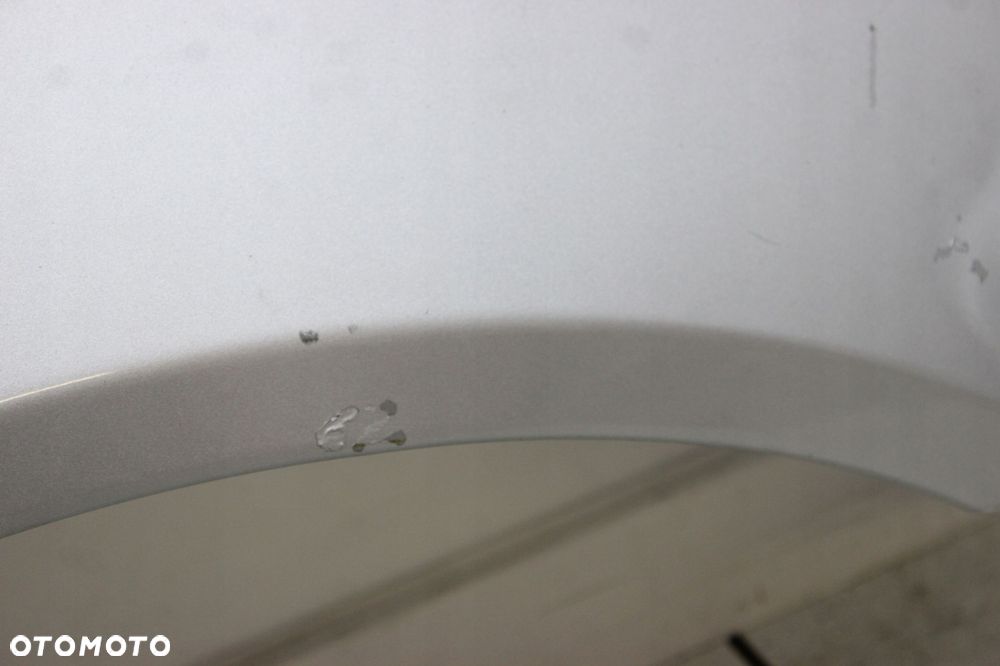 MITSUBISHI LANCER VIII 07R- BŁOTNIK PRAWY PRZÓD PRZEDNI A31B - 10