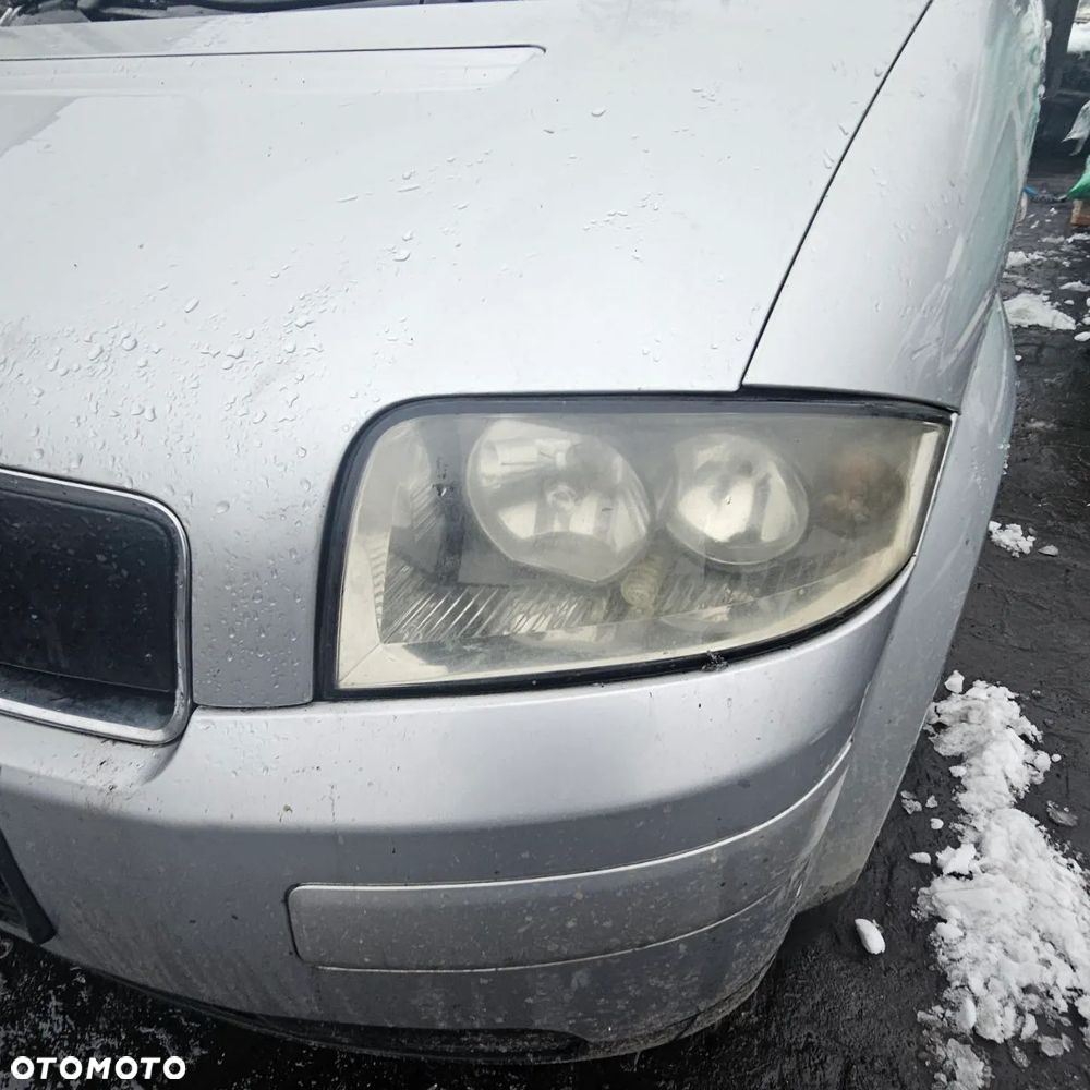 AUDI A2 (lak: LY7W) (sedan) pojazd na części: maska, zderzak, drzwi, szyby, lusterka, chłodnica - 7