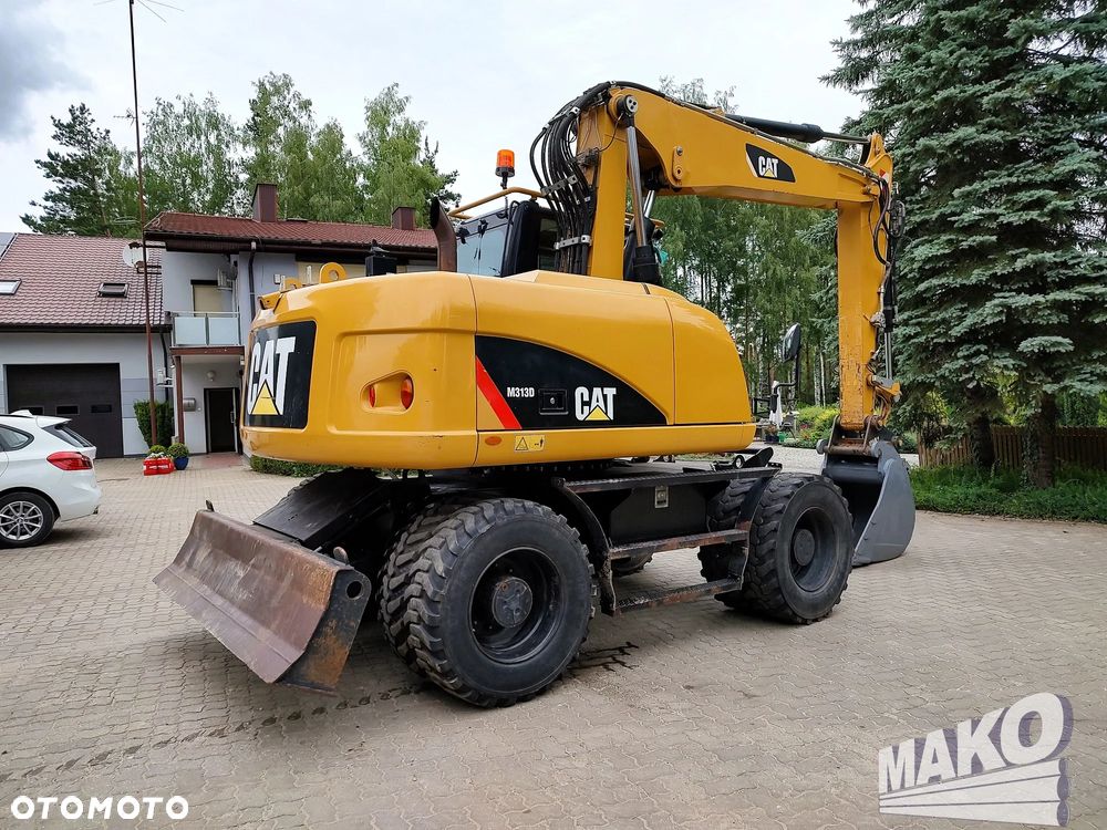 Caterpillar M313D - 4