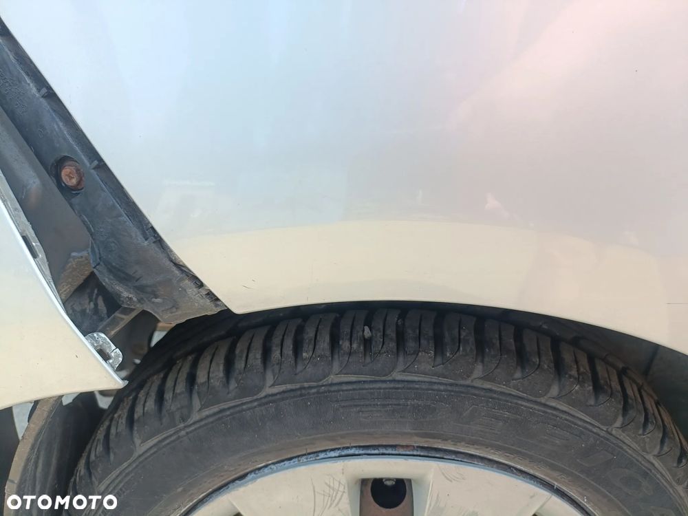 TOYOTA YARIS II 05-11 LIFT 2009 r. 1E7 5D HB błotnik ćwiartka prawy tył PT - 5