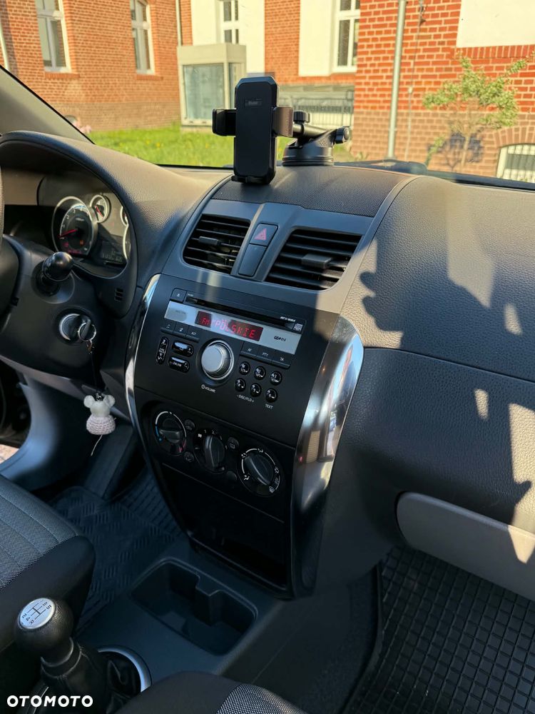 Suzuki SX4 1.6 Comfort Plus - 10