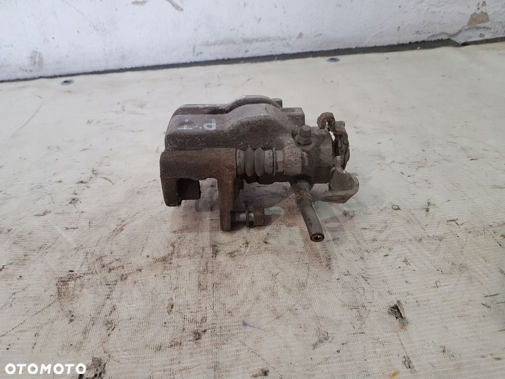 zacisk hamulcowy prawy tył fiat 500l 1.3d 12r- - 4