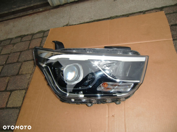 LAMPY PRAWA SOCZEWKA HYUNDAI H1 LIFT 92102 4H610 EUROP ŁADNA