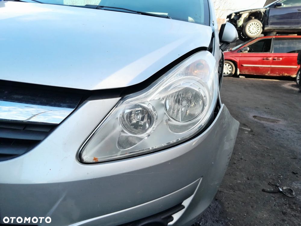 Lampa przednia lewa OPEL Corsa D 06-11r. Europa - 1
