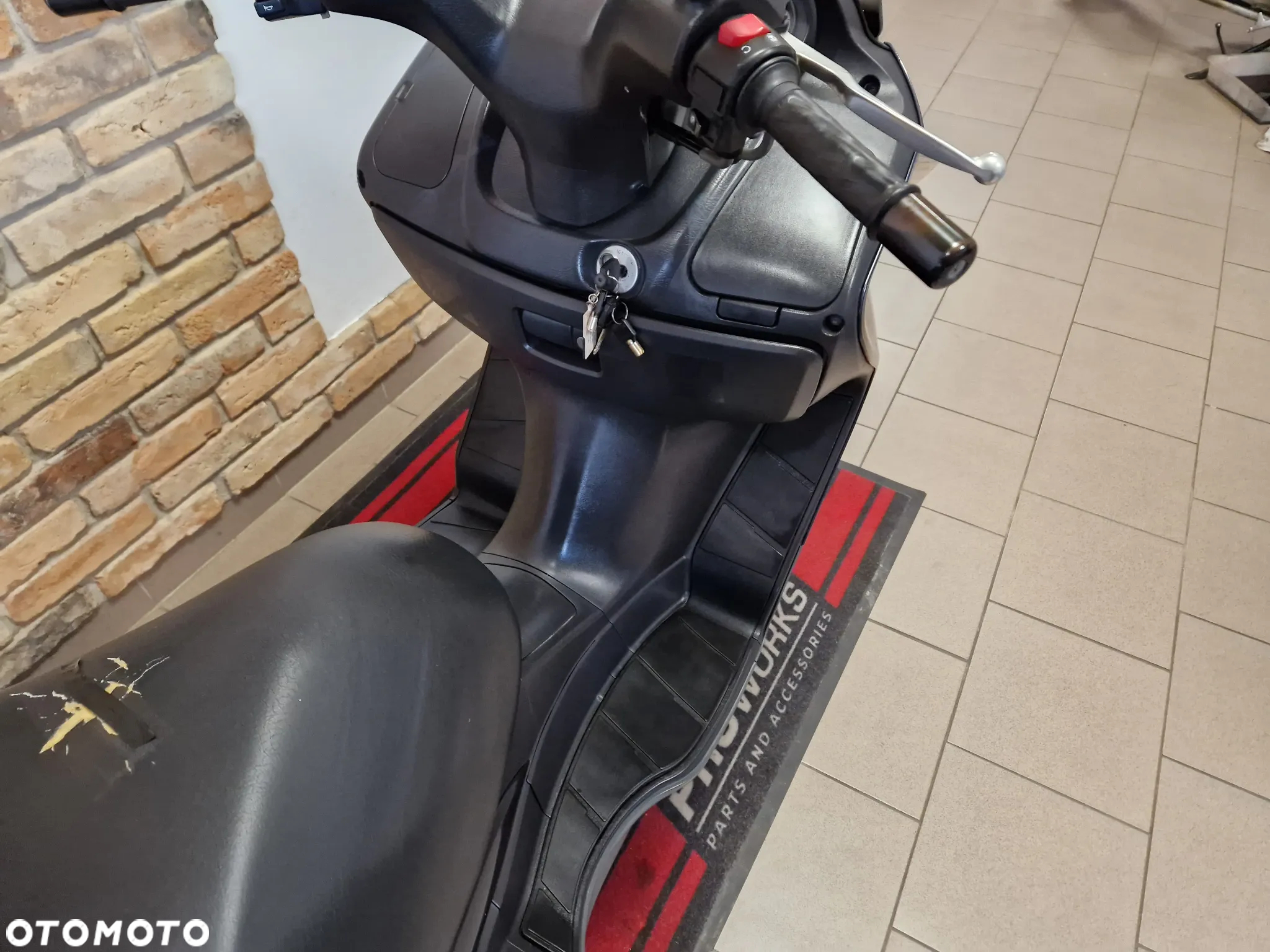 Suzuki Burgman - 21