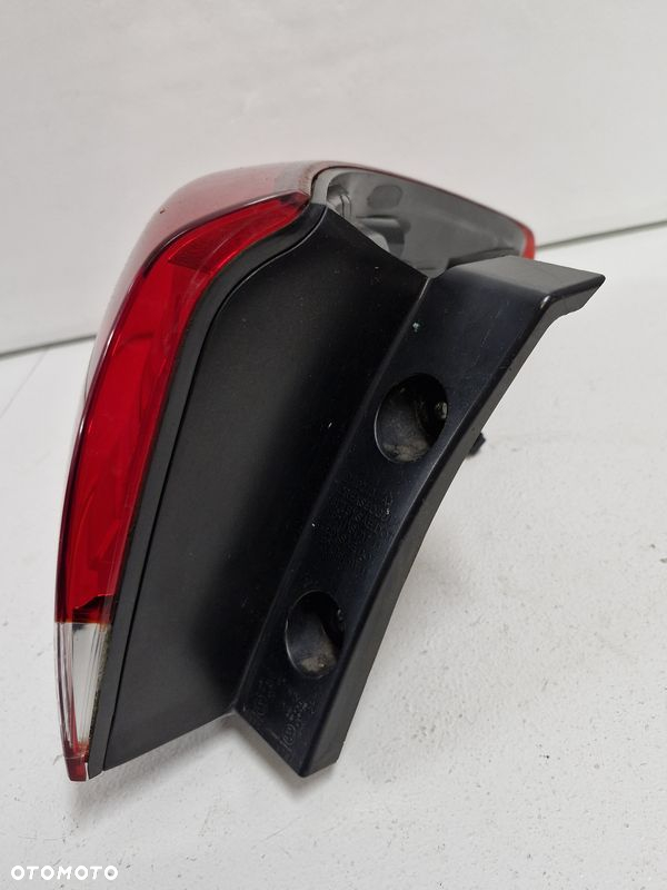 KIA CARENS 4 IV LAMPA LEWY TYŁ W BŁOTNIK LEWA TYLNA ŻARÓWKA - 2