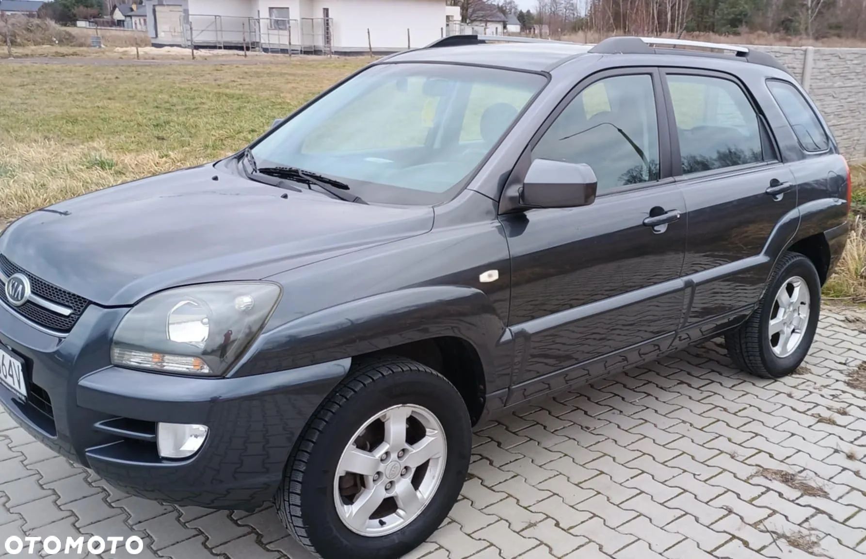 Kia Sportage 2.0 Tour - 1