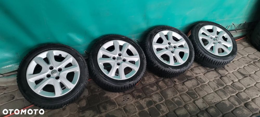 Opel Karl - Koła zimowe 15" - Czujniki + Kołpaki - 1