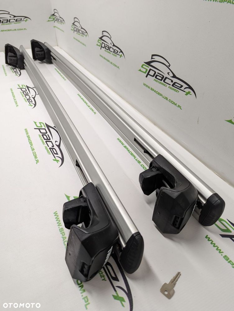 Bagażnik dachowy Thule: belki 711200 + Stopy 7104 Na otwarte relingi - 7