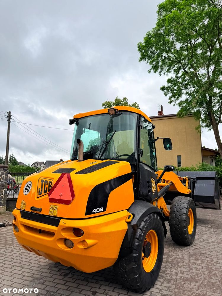 JCB 409 - 21