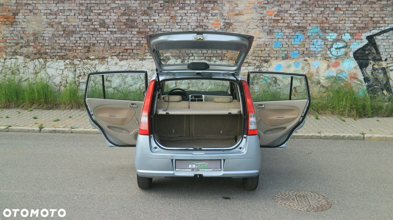 Daihatsu Cuore 1.0 Top - 21