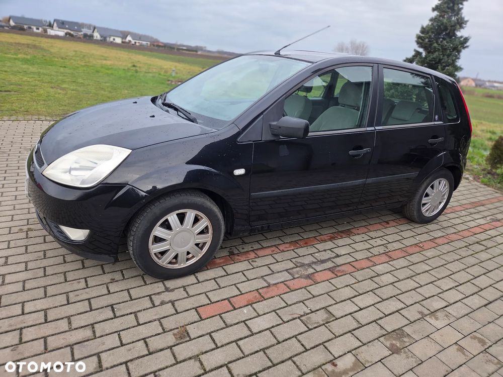 Ford Fiesta 1.4 Ghia - 6