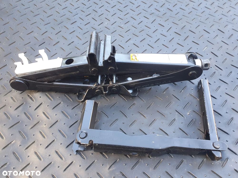 FORD MONDEO MK5 PODNOŚNIK KOŁA ZAPASOWEGO LEWAREK ES7C-17080-AA - 1