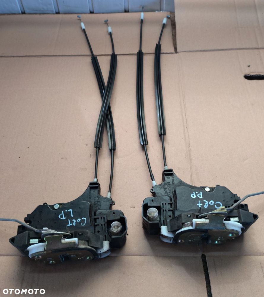 .Colt VI zamek drzwi przednie przód EU 5d Z30 Mitsubishi.