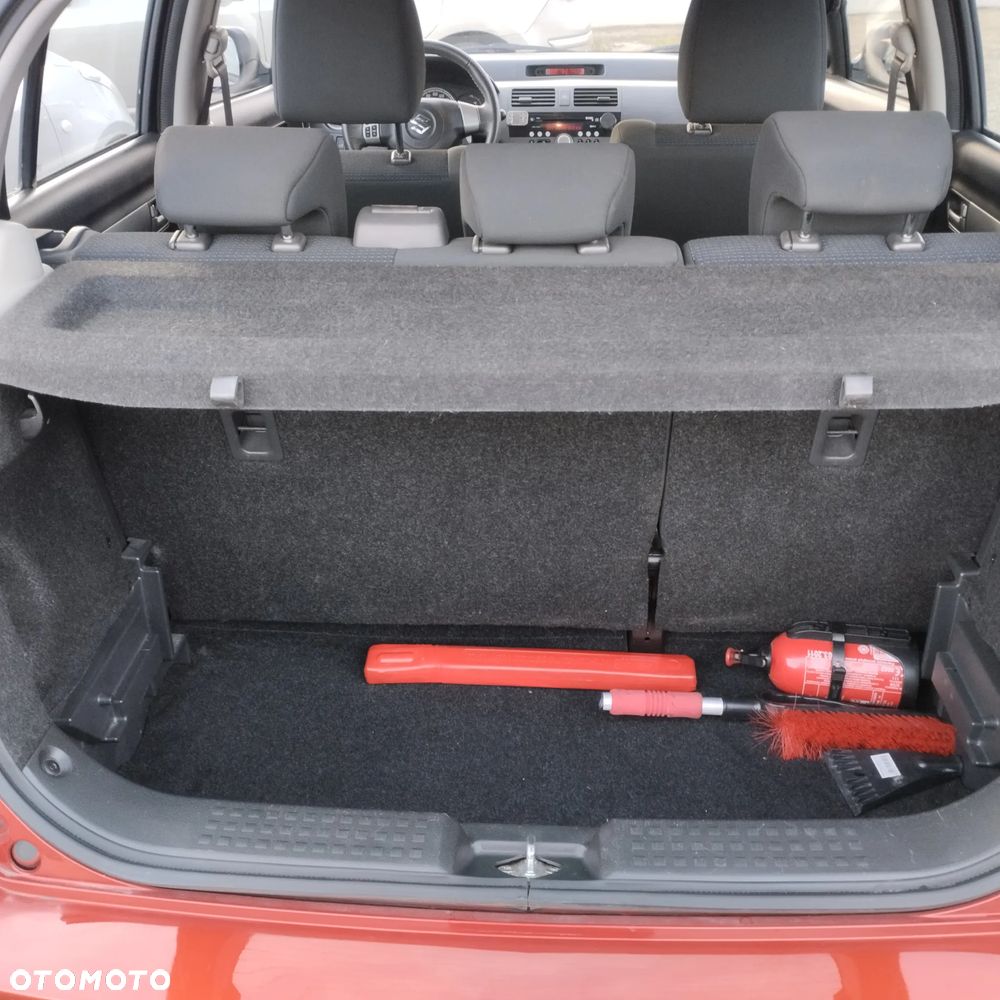 Suzuki Swift 1.3 Sakura - 13