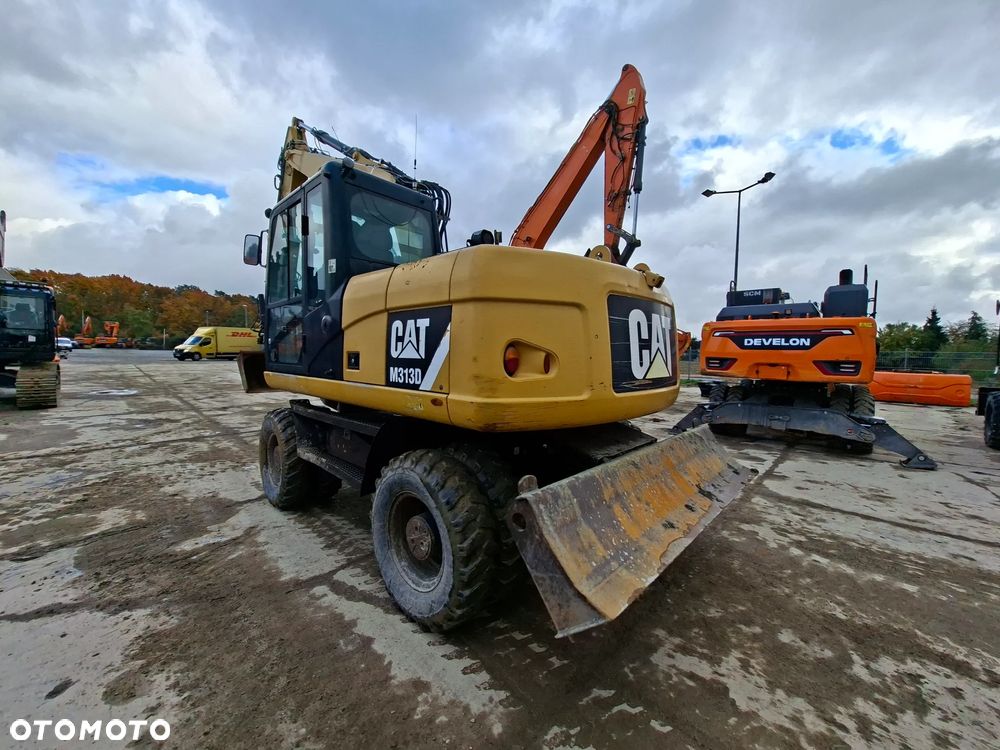 Caterpillar M313D - 2