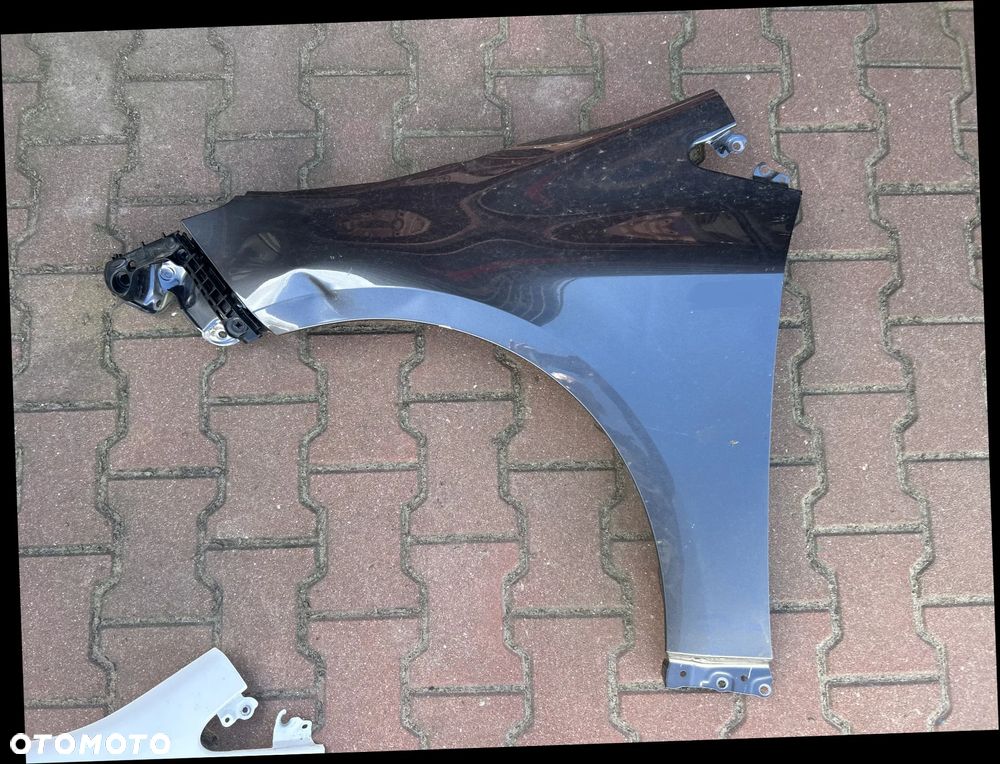 TOYOTA COROLLA E21 HB KOMBI 2019- BŁOTNIK LEWY PRZEDNI PRZÓD ŚLIZG MOCOWANIE UCHWYT BŁOTNIKA - 1