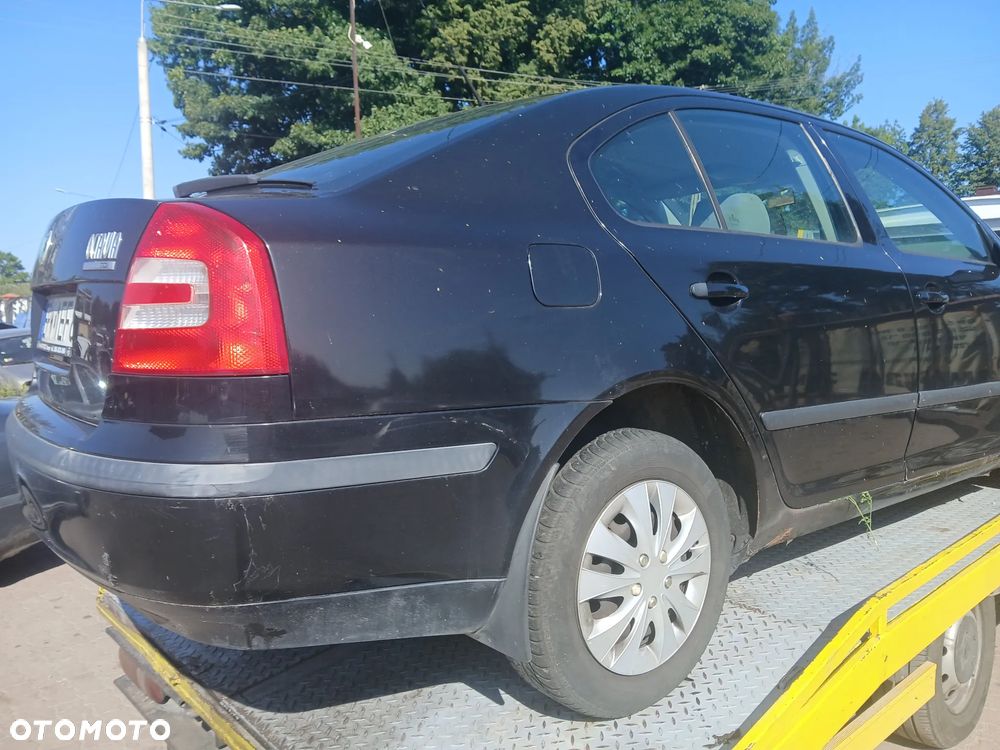 Skoda Octavia II HB 1Z1Z  maska pokrywa silnika klapa bagażnika zderzak lampa reflektor pas przedni stop lampy halogeny przeciwmgłowe odblaski grill atrapa - 4