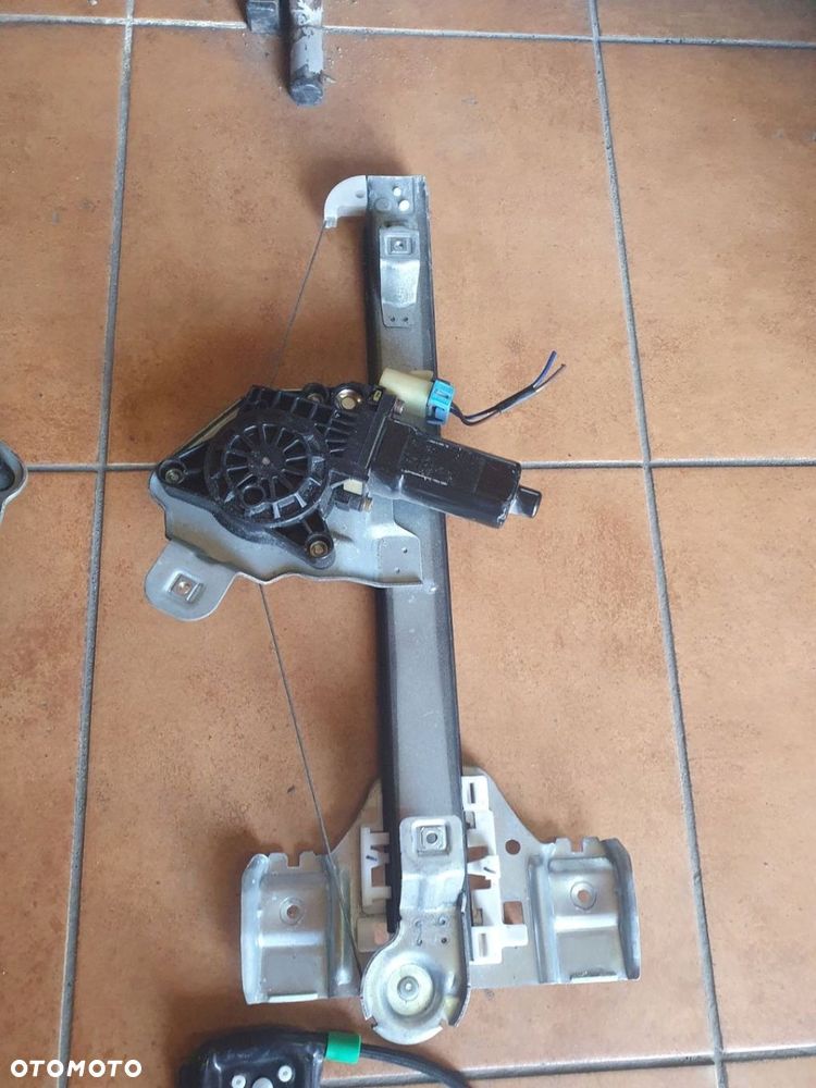 PODNOŚNIK SZYBY PRZÓD TYŁ L/P HUMMER H3 - 3