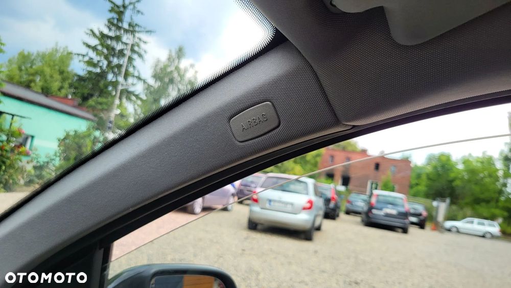 Opel Astra 1.4 Caravan - 31