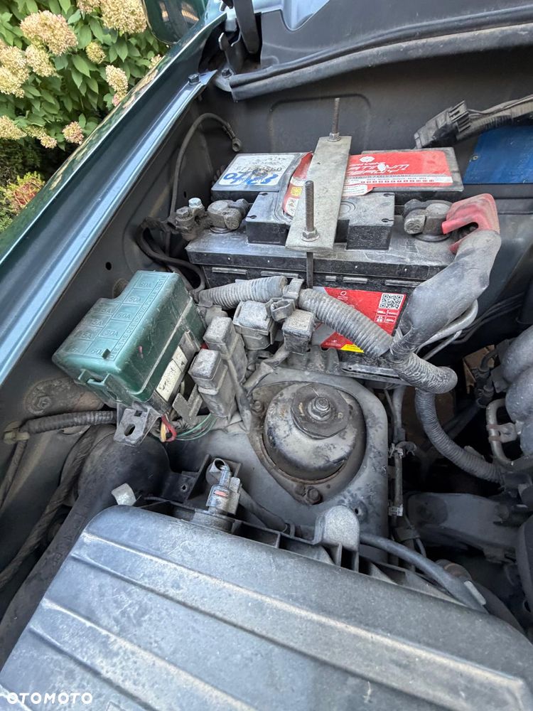 Suzuki Grand Vitara 1.6 - 13