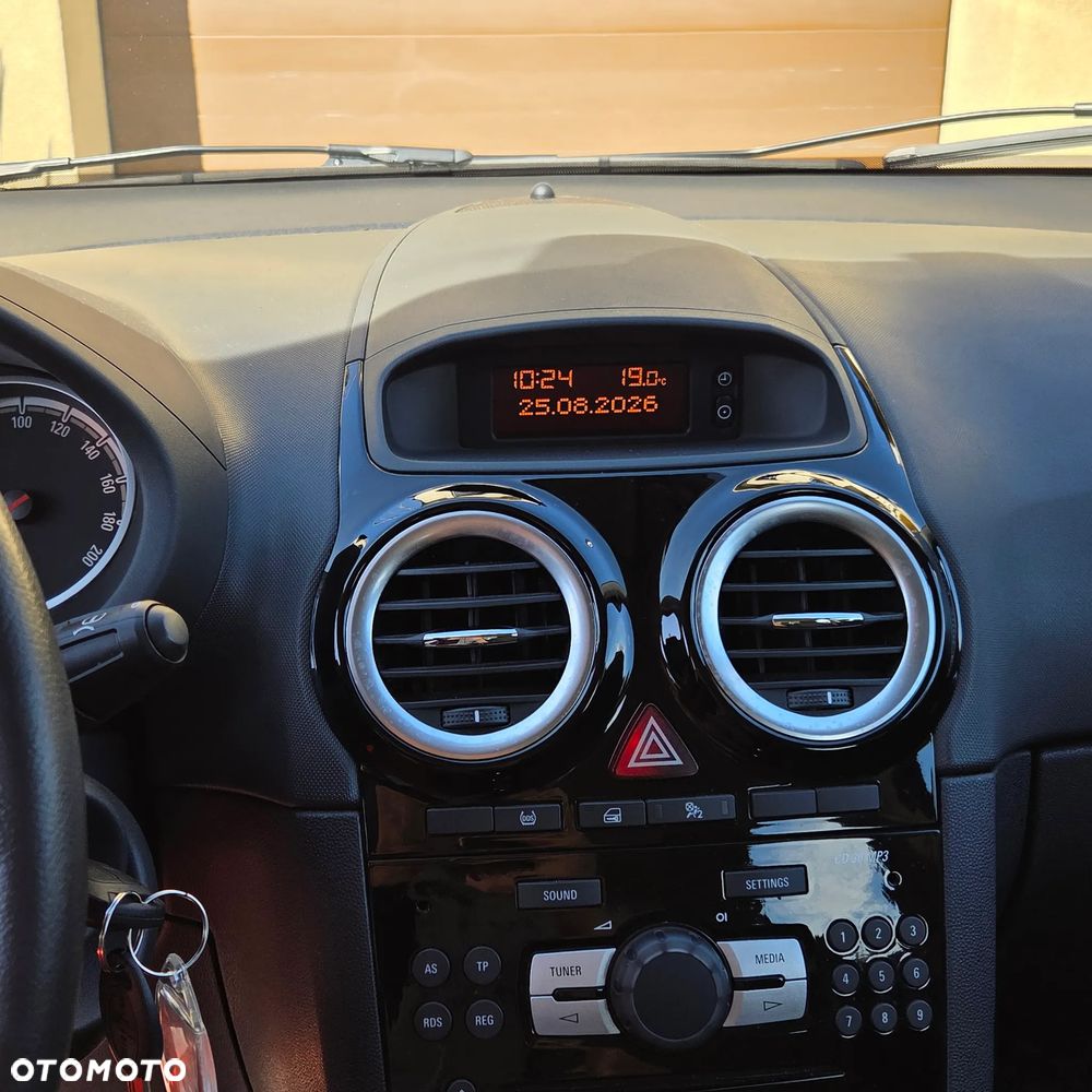 Opel Corsa 1.2 16V Enjoy - 12
